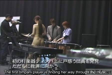 Nudist Japanese timpani player shows butt